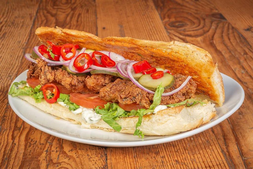 Pedro Po'Boy · Battered and fried. Served on Garlic bread with shredded lettuce, tomato, dill pickles, pickled red chili, signature Aioli & tartar sauce.