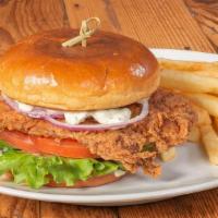 Crispy Fish Sandwich · Crispy whitefish fillet with lettuce, tomato, red onion & housemade tartar sauce on a brioch...