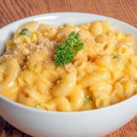 Mac + Cheese · Corkscrew pasta, creamy cheese sauce and garlic breadcrumbs