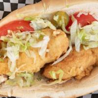 Fried Chicken Po Boy · Fried chicken on a French roll with lettuce, tomato, pickles, and non spicy Cajun Mayo.