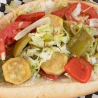 Veggie Po Boy · Zucchini, bell pepper blend, onion, and garlic sauté on a French roll with lettuce, tomato, ...