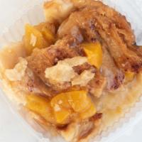 Peach Cobbler · Hand made crust with peaches and our sweet filling.