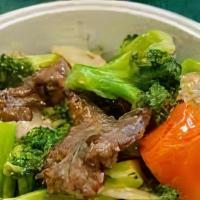 Broccoli Beef · Served with veggie egg roll pork chow mein and chicken fried rice.