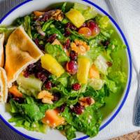 Fruit Walnut Salad · Romaine, crumbled Gorgonzola cheese, walnuts, craisins, fresh seasonal fruit and raspberry v...
