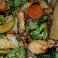 Chicken Teriyaki · Grilled chicken, steamed white rice, carrots, squash and broccoli and topped with a teriyaki...