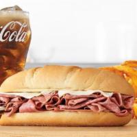 Classic French Dip & Swiss Meal · Thinly sliced roast beef with melted swiss cheese on a toasted sub roll. Served with au jus ...