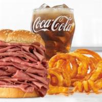 Roast Beef Half Pound Meal · A half pound of thinly sliced roast beef on a toasted sesame seed bun. Visit arbys.com for n...