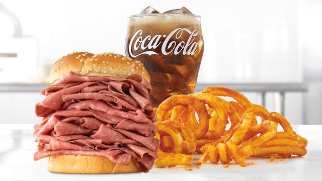Roast Beef Half Pound Meal · A half pound of thinly sliced roast beef on a toasted sesame seed bun. Meal includes choice of side and drink.