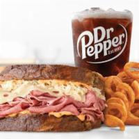 Reuben Meal · Marbled rye bread filled with freshly sliced corned beef, melty Swiss Cheese, tangy sauerkra...