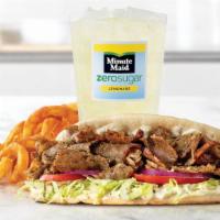 Greek Gyro Meal · A blend of beef, lamb and Mediterranean spices sliced from a spit rotisserie and placed on a...