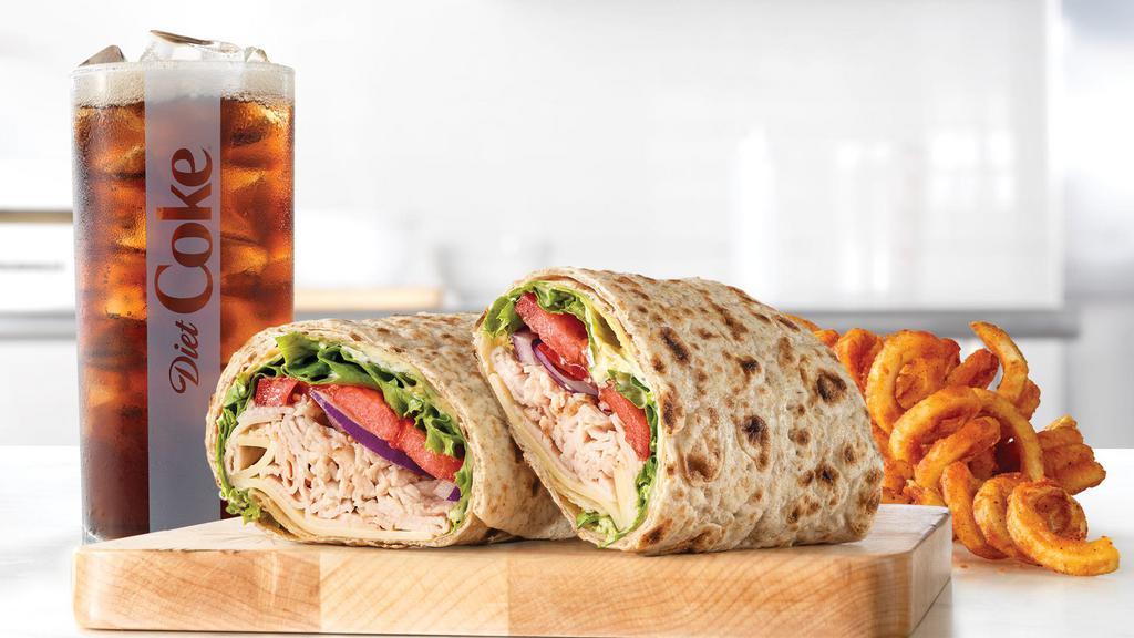 Market Fresh® Roast Turkey & Swiss Wrap Meal · Sliced roast turkey with Swiss cheese, lettuce, tomato, red onion, spicy brown honey mustard and mayo in a hearty grain wrap. Visit arbys.com for nutritional and allergen information.