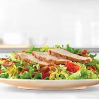 Roast Chicken Salad · Juicy chicken and crispy pepper bacon share the spotlight on this salad with lettuce, tomato...