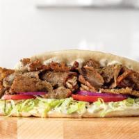 Traditional Greek Gyro · New. A blend of beef, lamb and Mediterranean spices sliced from a spit rotisserie and placed...