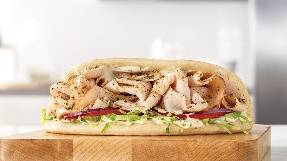 Turkey Gyro · Thinly sliced seasoned roast turkey with Greek Seasonings, cool creamy tzatziki sauce, shredded lettuce, tomato and red onion in a warm pita. Visit arbys.com for nutritional and allergen information.