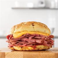 Classic Beef 'N Cheddar · Thinly sliced roast beef with Cheddar cheese sauce and zesty Red Ranch sauce on a toasted on...