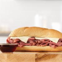 French Dip & Swiss · Thinly sliced roast beef with melted swiss cheese on a toasted sub roll. Served with au jus ...