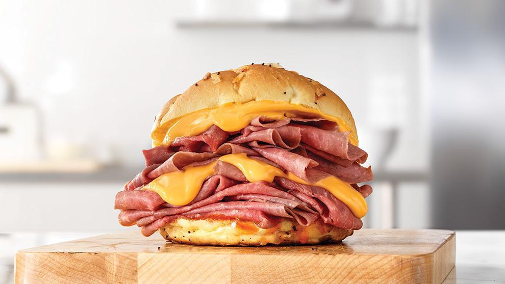 Beef 'N Cheddar Double · Two times the amount of thinly sliced roast beef than the Classic, with cheddar cheese sauce and zesty red ranch sauce on a toasted onion roll.  Visit arbys.com for nutritional and allergen information.