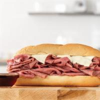 French Dip & Swiss Half Pound With Au Jus · A half pound of thinly sliced roast beef with melted Swiss cheese on a toasted sub roll. Ser...
