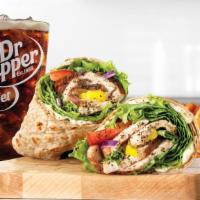 Creamy Mediterranean Chicken Wrap Meal · Slow-roasted chicken breast with cool and creamy tzatziki sauce, banana peppers, green leaf ...