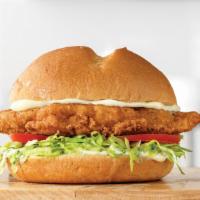 Crispy Chicken · A crispy buttermilk chicken breast with lettuce, tomato, and mayo on a toasted specialty bun...