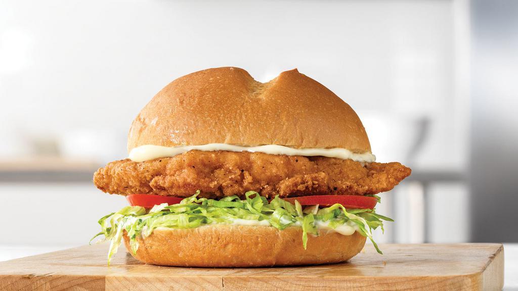 Classic Crispy Chicken Sandwich · A crispy buttermilk chicken breast with lettuce, tomato, and mayo on a toasted specialty bun. Visit arbys.com for nutritional and allergen information.