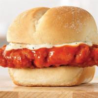 Buffalo Chicken Slider · A crispy chicken tender dipped in spicy buffalo sauce and topped with Parmesan Peppercorn Ra...