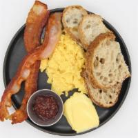 Scrambled Eggs And Bacon · 2 organic scrambled eggs, Hobb's bacon, sourdough toast, baguette slices, French butter and ...