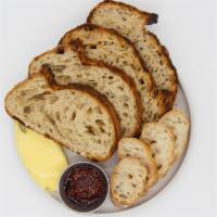 Bread Basket · Clark Street Bread Basket. 3 slices of 3 different breads, a side of French butter + a side ...