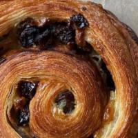 Pain Aux Raisins · Croissant dough filled with yummy pastry cream and raisins.