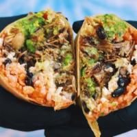 Carnitas Burrito · Our famous carnitas wrapped in a fresh sonora style flour tortilla filled with cilantro rice...