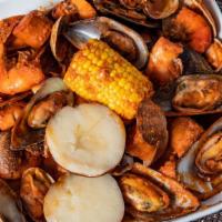 1/2 Lb. Shrimp, 1/2 Lb. Mussels, 1/2 Lb. Live Clams · All Combo include 1 corn,1 potato,3 pieces of sausages. One person meal