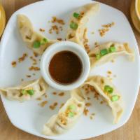 Dumpling (6) · Choice of fried or steamed dumplings stuffed with chicken and vegetable served with dumpling...
