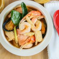 Seafood Soup · Spicy. Assorted seafood in spicy and sour lemongrass soup, with Thai herbs, mushroom and lim...
