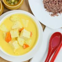 Yellow Curry · Spicy. Yellow curry paste in coconut milk with potatoes and carrot.