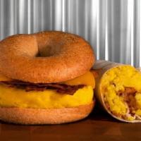 Bacon & Cheddar Sandwich · Bacon and egg breakfast sandwich with cheddar cheese on on your choice of bagel.