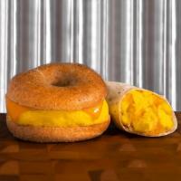 Egg & Cheese Sandwich · Egg and cheese breakfast sandwich with cheddar cheese, served on your choice of bagel