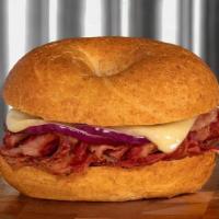 Hot Pastrami · Thin sliced beef pastrami served with red onion and topped with melted jack cheese on your c...