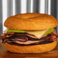 Hot Black Forest Ham · Thinly sliced Black Forest ham served with crispy bacon and fresh avocado slices, topped wit...
