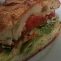 Avocado Focaccia Sandwich · Avocado Sandwich made with house made Focaccia, Mozzarella, Arugula, Olives