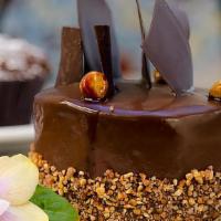 Chocolate Hazelnut Cake (Individual) · Chocolate hazelnut sponge cake layered with Nutella and hazelnut icing. Covered in chocolate...