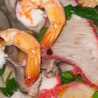 Hủ Tiếu King Khô · Dry rice noodle with shrimp, fish ball, squid, BBQ pork, and ground pork.