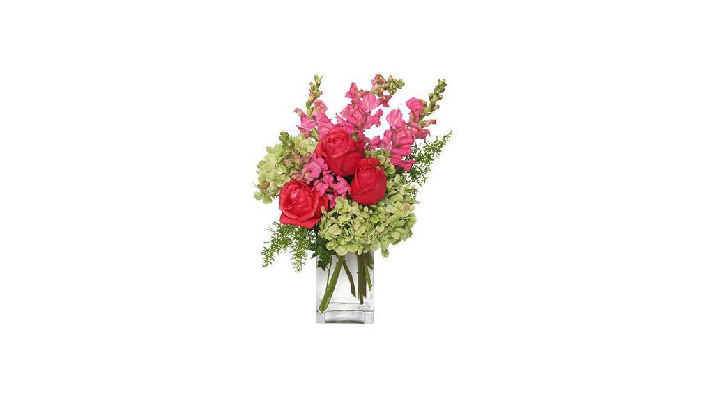 Tutti Frutti · This bouquet is the perfect way to spoil them! Featuring alluring deep coral roses, darling pink snapdragons, and a striking green hydrangea, Tutti Frutti is a spunky mix perfect for any occasion. Send these bright and happy blooms to someone you love to make their day!