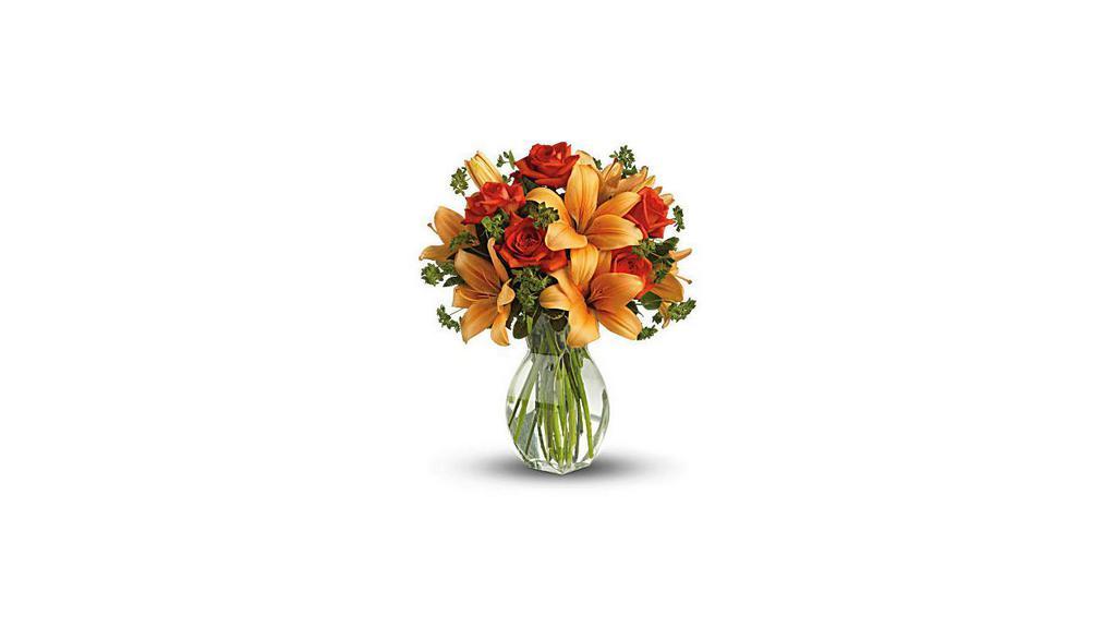 Rose And Lily Fall Bouquet · Ignite their heart with this inspirational gift of warm orange roses and lilies. As wondrous as a summer sunset - but quite a bit more fragrant! - it's a versatile choice for men and women alike. Dark orange roses and asiatic lilies are mixed with fresh green bupleurum and variegated pittosporum.