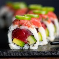 Double Tuna Roll · Tuna, Avocado, Cucumber, White Sesame Seeds, Sushi Rice, Nori, topped with Spicy Tuna and Se...