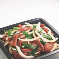 Mongolian Beef · Stir-fried sliced tender beef with green onions, brown onions in our chef's special brown sa...