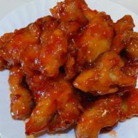 Sesame Chicken · Breaded chicken breast fresh-fried to a crisp stir fry with the red special sauce with the s...
