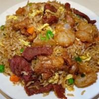 House Special Fried Ric · Fried rice with chicken, pork, shrimp, peas, carrots and onions.