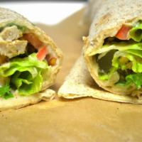 Chicken Wrap · Deliciously tender, marinated chicken breast with homemade garlic sauce, tomatoes, pickles a...