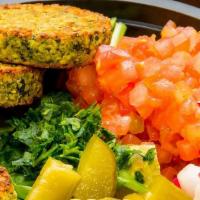 Baked Falafel Platter · Your choice of baked falafel on a bed of basmati rice. Served with a freshly baked pita brea...