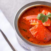 Chicken Vindaloo · Boneless chicken prepared with potatoes in hot spices.